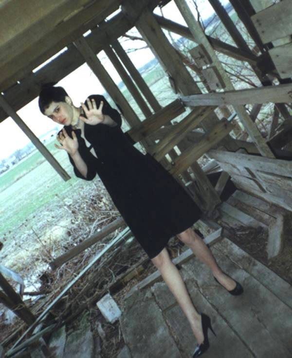 My be the last photo of 14 years Regina Kay Walters, the victim of serial killer Robert Ben Rhoades, known as ‘Truck Stop Killer”. Photos shows scared Regina Kay Walters in just above knee-height black dress and black, raised hand as if to protect herself